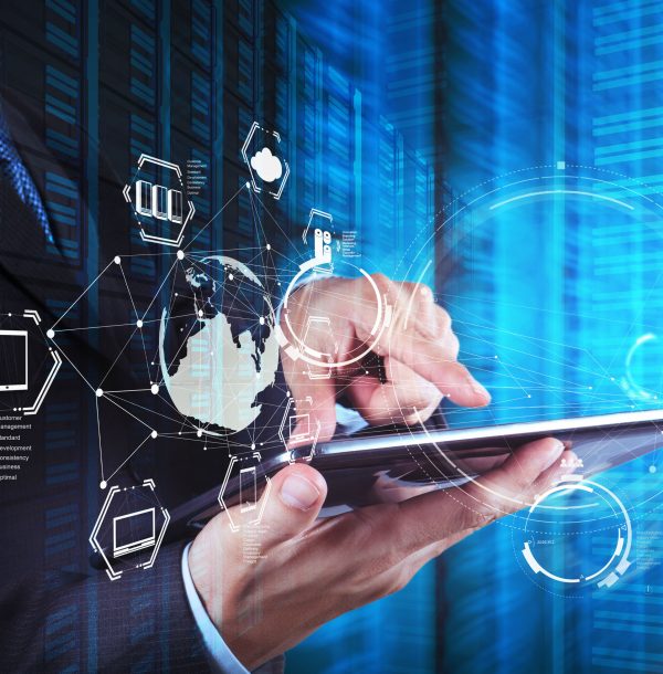 Double exposure of businessman shows modern technology as concept